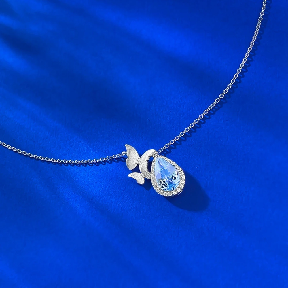 collier avec pendentif topaze poire sertie