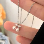pendentif maison du Pendentif perle cerise en perle nacrée