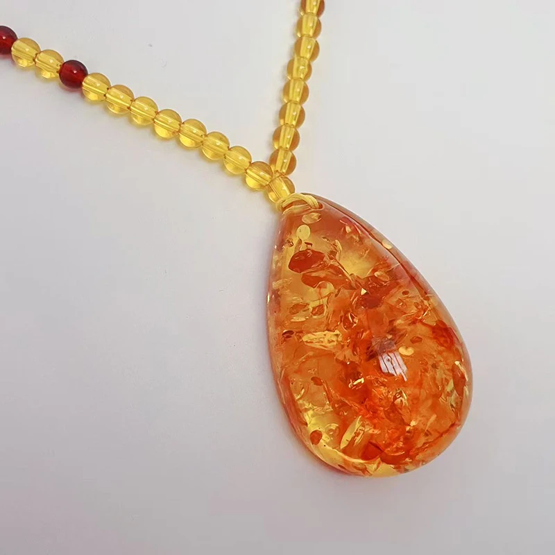 pendentif ambre jaune pierre translucide