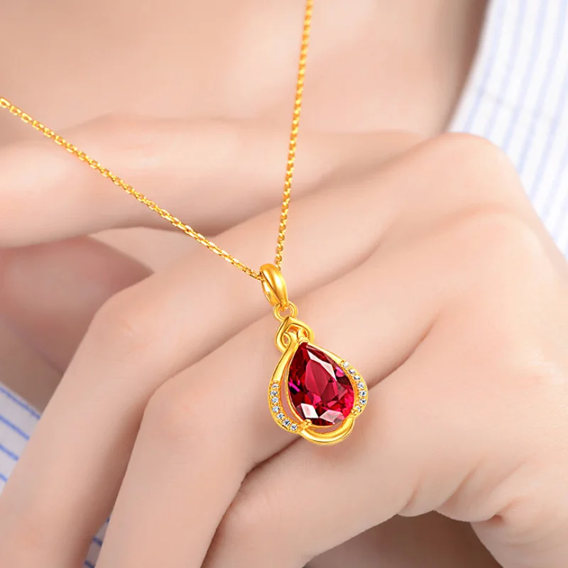 bijou en or avec rubis en goutte