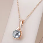 pendentif perle grise