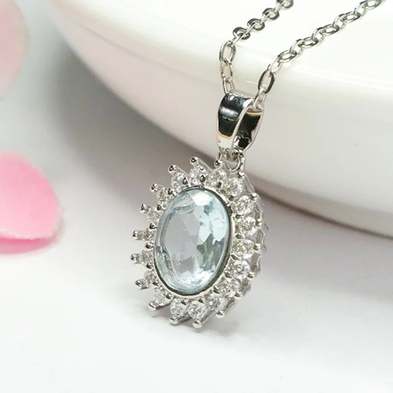 pendentif en argent avec Topaze Bleue