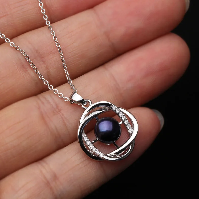 bijou en argent avec perle noire