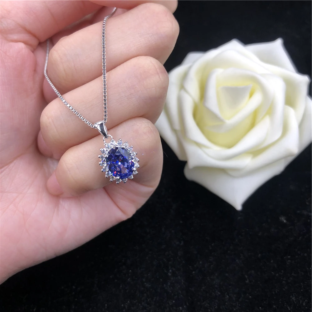 bijou en or blanc avec saphir bleu