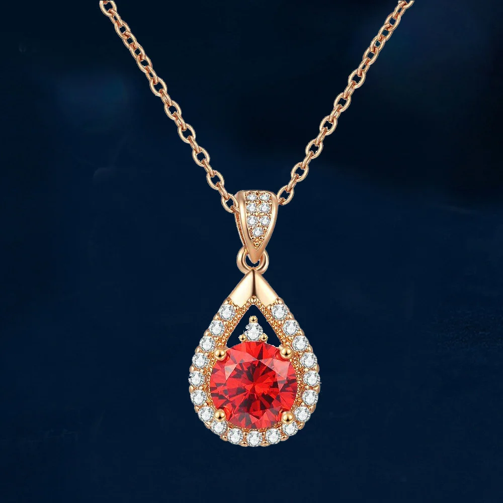 bijou en or avec rubis en forme de poire
