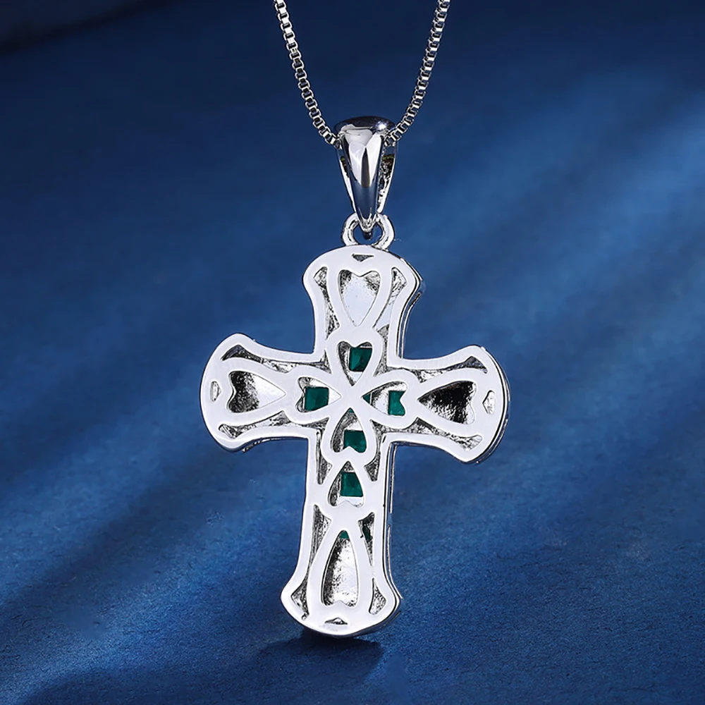 bijou croix émeraude en pendentif