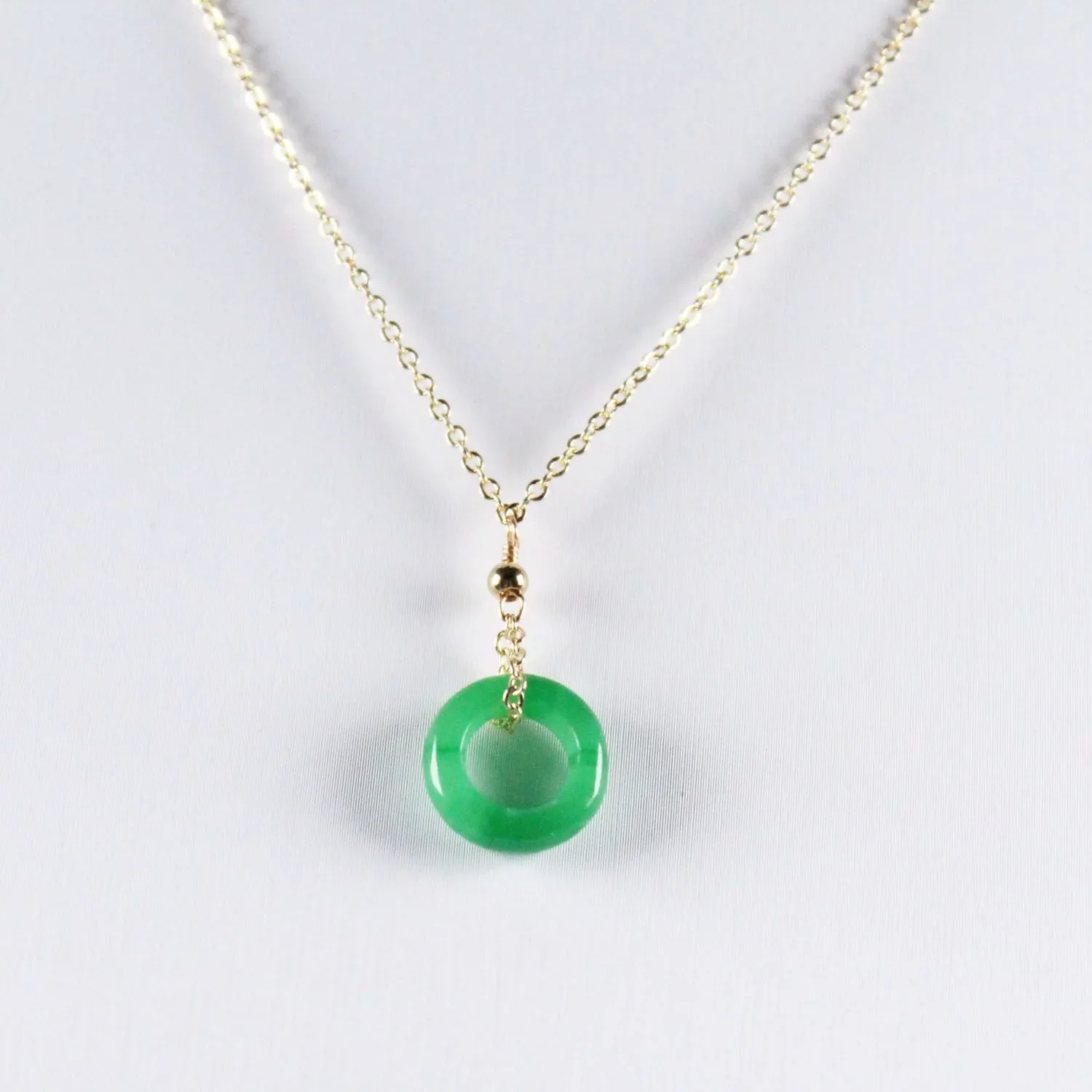 pendentif en jade doré rond